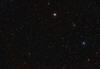 M75 Globular cluster and Pluto in Sagittarius